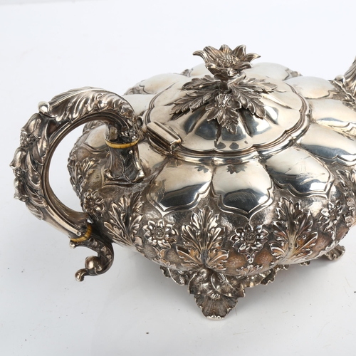 1477 - A William IV silver melon teapot, with relief embossed and chased floral decoration, flowerhead knop... 