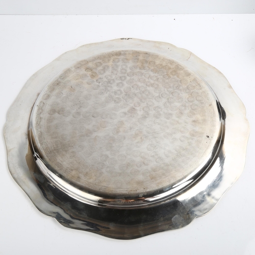 1478 - A large Portuguese silver serving platter, plain circular form with scalloped rim, eagle hallmark 91... 