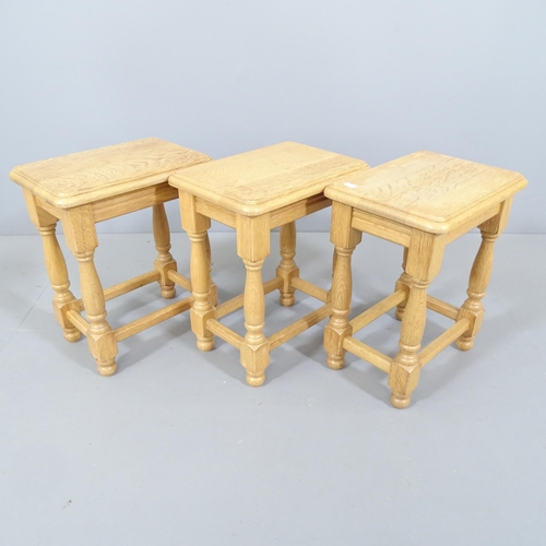 2223 - A set of three light oak joint stools. 34x42x24cm, and another (4)