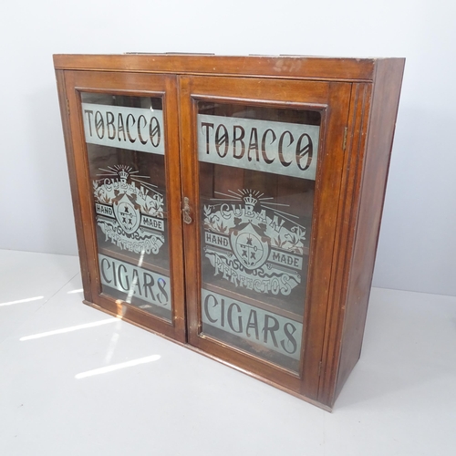 2109 - An antique mahogany tobacconist themed shop display cabinet with two glazed doors and three fixed sh... 