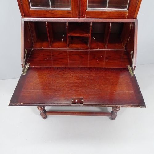 2142 - A 1920's oak bureau bookcase. 75x188x41cm