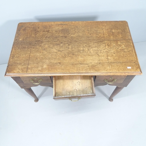 2143 - An 18th century oak lowboy with 3 drawers. 101x80x56cm.