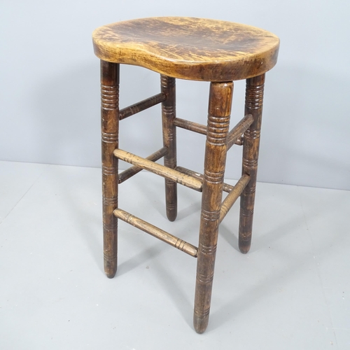 2145 - An oak bar stool. H76cm