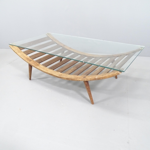 2147 - A teak bentwood and glass topped coffee table. 89x29x45cm.