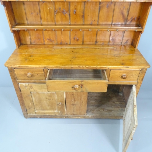 2153 - An antique reclaimed pine two section dresser. 156x183x55cm