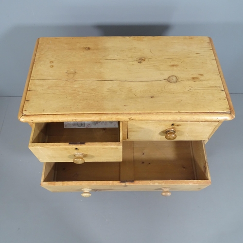 2157 - A small Victorian pine four drawer chest. 83x83x47cm