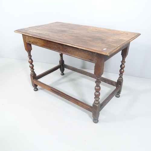 2159 - An 18th century joined oak centre table, raised on turned legs. 100x70x58cm