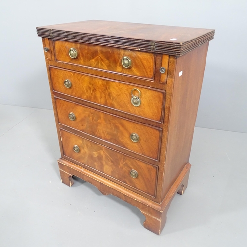 2180 - A reproduction mahogany chest, with fold over top and four drawers under. 59x80x35, top opens to 70c... 