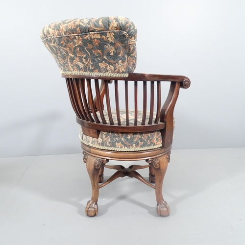 2190 - A Victorian mahogany revolving bow arm office chair, button back upholstered, raised on cabriole leg... 