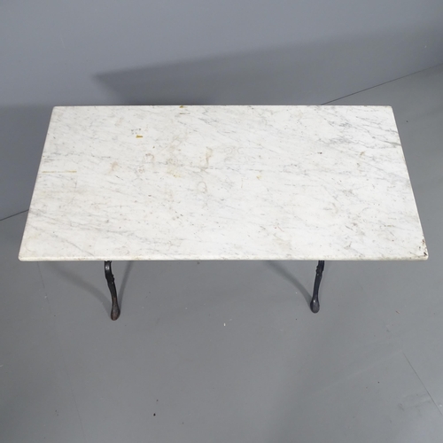 2194 - A rectangular marble topped garden table on cast iron base. 103x73x50cm.