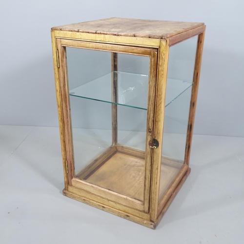 2198 - A pine framed shop display cabinet, glazed panels with single shelf. 54x91x57cm