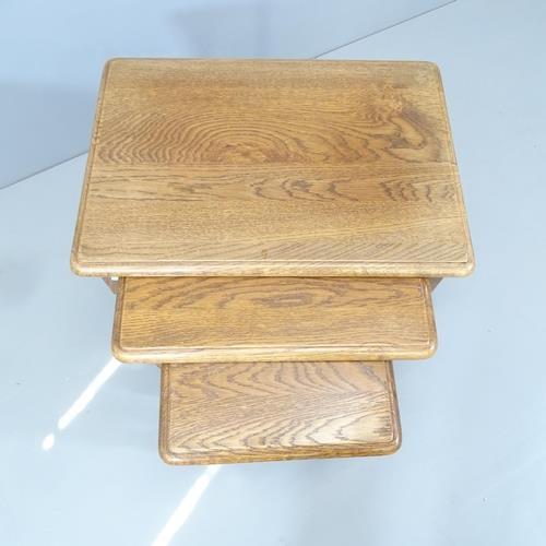 2212 - An Ipswich Oak design nest of three occasional tables. Largest 60x51x43cm.