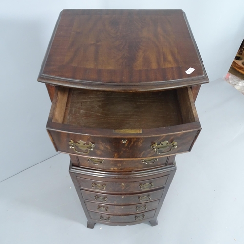 2218 - A reproduction mahogany bow front chest on chest. 48x125x40cm