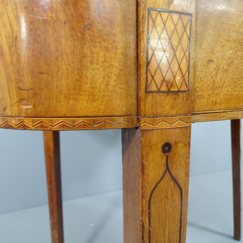 2226 - A regency mahogany fold over tea table, raised on ebony banded tapered legs. 91x74x44cm, opening to ... 