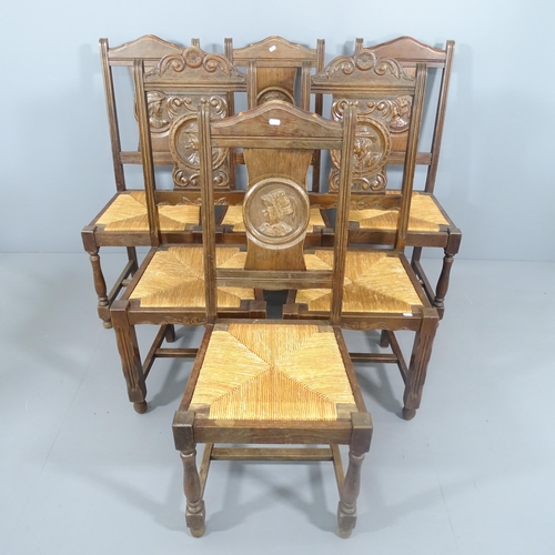 2228 - A set of four Breton carved oak chairs and a similar pair