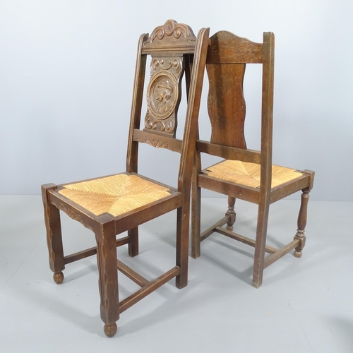 2228 - A set of four Breton carved oak chairs and a similar pair