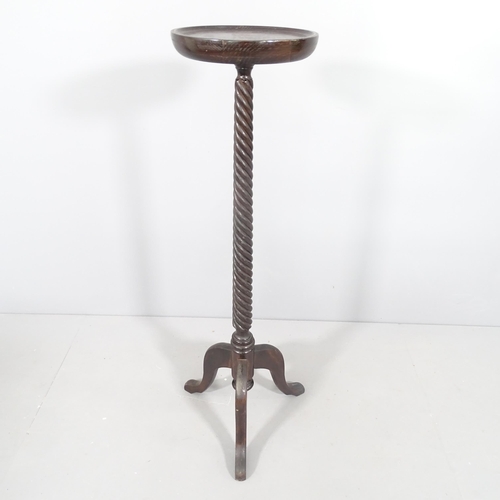 2241 - A stained wood torchere stand with spiral twist column, on tripod base. H - 108cm.