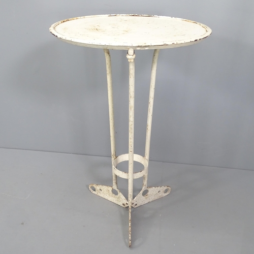 2013 - A vintage painted metal circular-topped side table. 54x81cm.