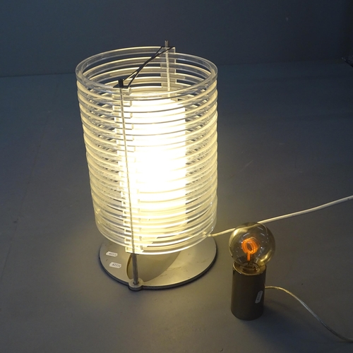 2014 - A vintage spring table lamp, with acrylic outer and glass inner shades on steel base, height 43cm, a... 