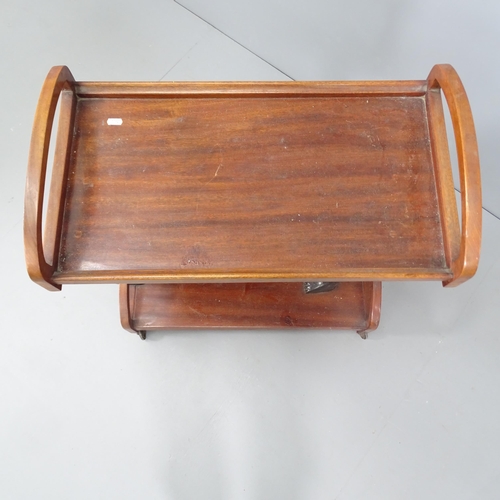 2022 - A mid-century mahogany two-tier drinks trolley, with blackamoor figure supports. 68x78x36cm.