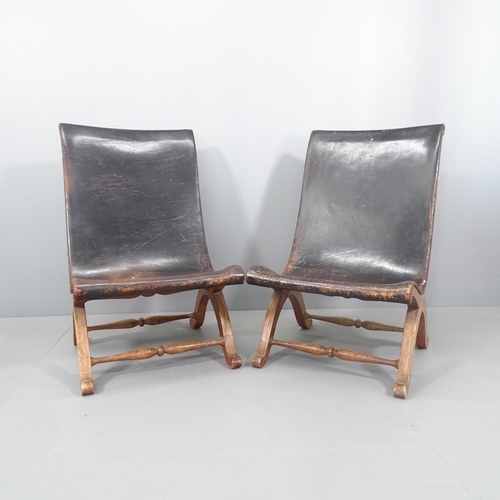 2023 - A pair of black studded leather upholstered slipper chairs with oak frame, in the manner of Pierre L... 