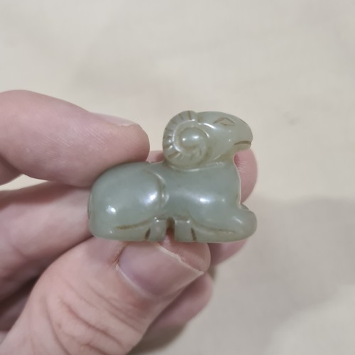 85 - 3 Chinese jade carvings, comprising a reclining figure (length 8cm), a mythical creature, and a Qili... 