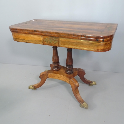 2246 - A Regency rosewood and brass inlaid card table. 90x74x45, opening to 90cm.