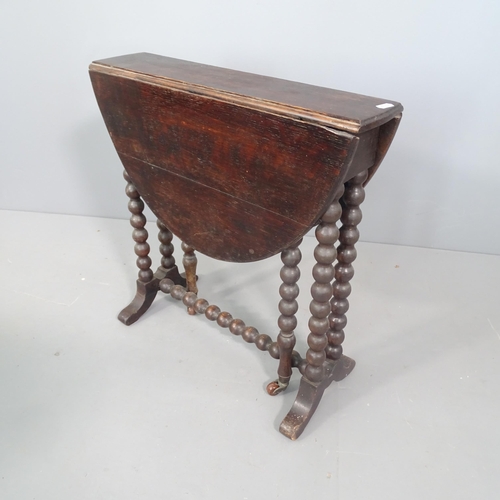 2260 - An antique oak gateleg table, with bobbin turned legs. 54x55x12, opening to 68cm.