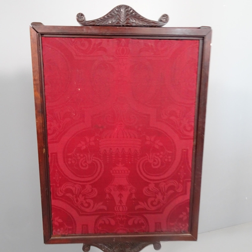 2272 - A Victorian firescreen with pull out central panel. 55x113x37cm.