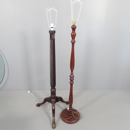 2277 - A mahogany standard lamp with turned column and another mahogany standard lamp (2). Tallest - 137cm.