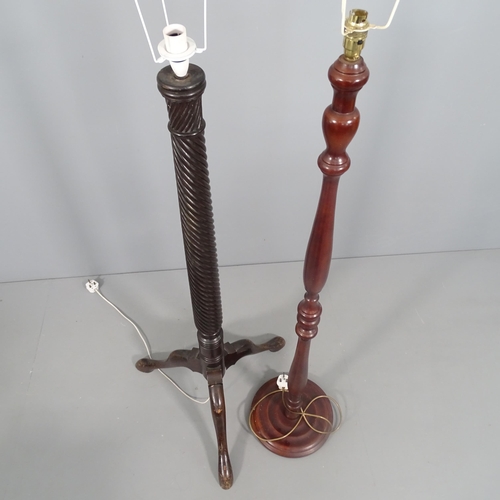 2277 - A mahogany standard lamp with turned column and another mahogany standard lamp (2). Tallest - 137cm.