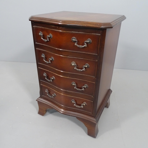 2279 - A small mahogany serpentine fronted chest of 4 drawers.  40x62x36cm.