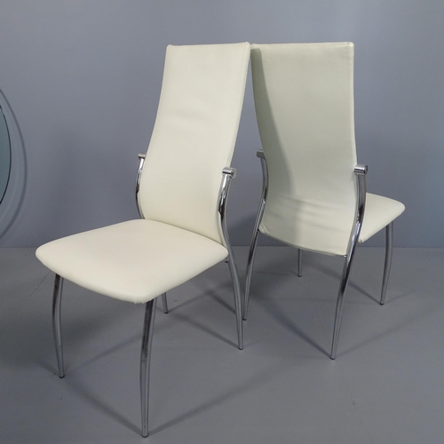 2288 - A set of 4 white faux leather upholstered dining chairs on chromed tubular bases.