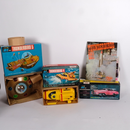 60 - THUNDERBIRDS - A JR 21 TOY - a set of boxed toys from the 1960s TV Series Thunderbirds, including Th... 