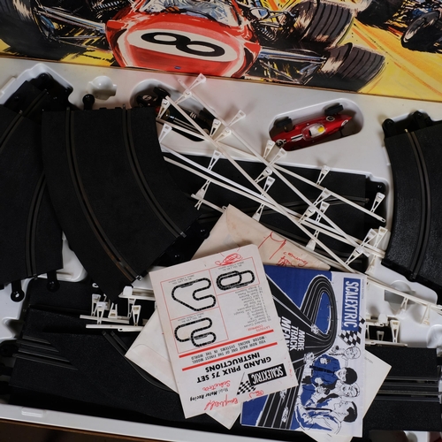 63 - SCALEXTRIC - a boxed Grand Prix 75 set, appears complete and with original vehicles, associated inst... 