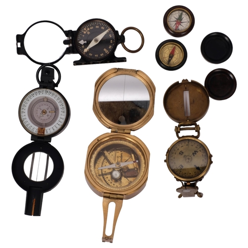 287 - A collection of various compasses, including 2 pocket compasses, a brass-cased compass, a reproducti... 