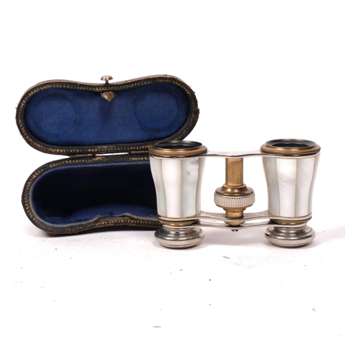 293 - A pair of small early 20th century chrome plate and mother-of-pearl opera glasses, cased (no maker's... 