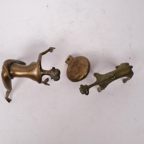 299 - A stylised Nigerian bronze female figure, a small pot and another (3)