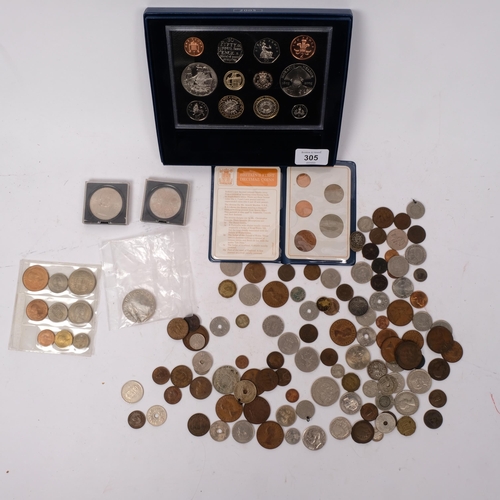 305 - A group of various coins, including a 2005 United Kingdom proof set, a Trafalgar commemorative £5 co... 