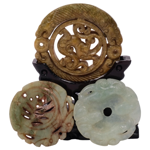 310 - 2 jadeite discs, and a soapstone disc on stand (3)