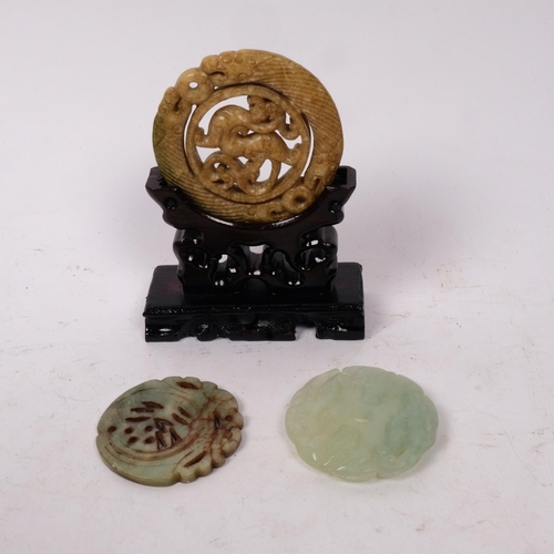 310 - 2 jadeite discs, and a soapstone disc on stand (3)