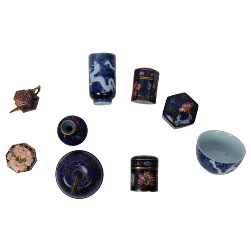 313 - A group of Oriental cloisonne boxes, teapot, miniature tape measure, a Chinese blue an white tea bow... 