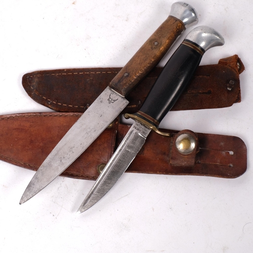 328 - A small Swedish Holmberg, Sweden, a small hunting knife, 18cm, with leather scabbard, and another kn... 