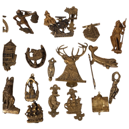 349 - A large quantity of brass door knockers, including a Dartmoor Pisky, the Norseman etc