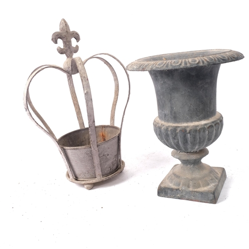 352 - A small cast-iron Campana style urn, H22cm, and a painted metal coronet style plant pot, H31cm (2)