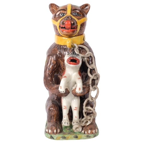 358 - A large reproduction Staffordshire bear jug and lid, H30cm