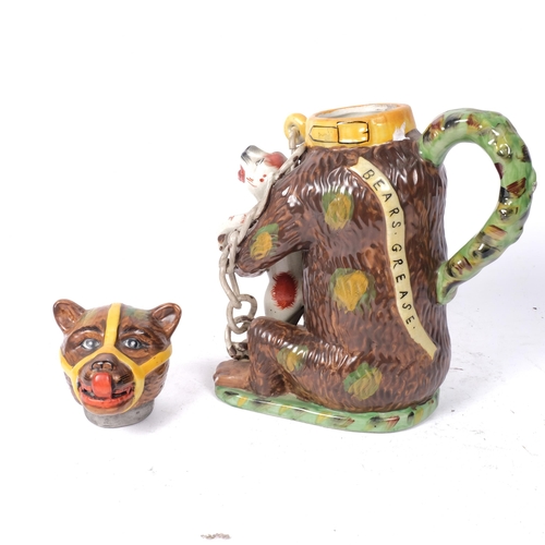 358 - A large reproduction Staffordshire bear jug and lid, H30cm