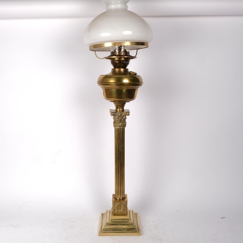 363 - ELTEX - a brass Corinthian column table lamp with milk glass shade, H86cm