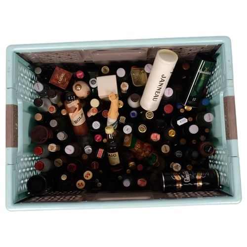 374 - A large quantity of miniature spirit bottles, including Glenfiddich, Dimple, White & Mckay Special W... 