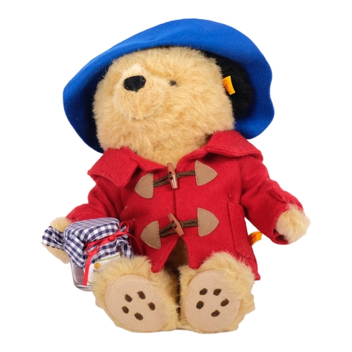 128 - STEIFF - a Steiff Paddington Bear with associated tag and original box, ref. 354700